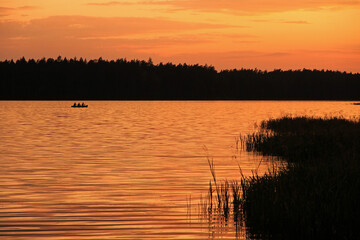 Sunset over Mikaszewo lake in Augustow Primeval Forest, Suwalki Region in Poland