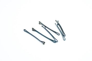 Black hair clips on a white background