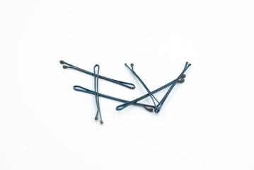 Black haiBlack hair clips on a white backgroundr clips on a white background