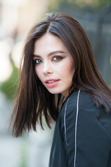 Obraz premium Portrait of beautiful young woman with makeup 