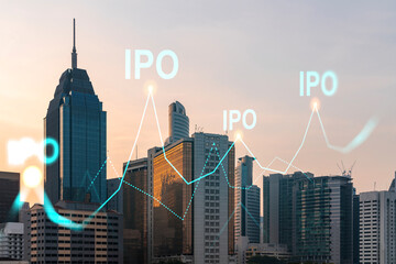 Hologram of IPO glowing icon, sunset panoramic city view of Kuala Lumpur. KL is the financial hub...