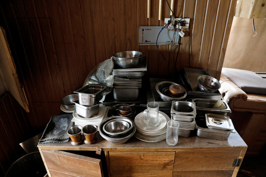 Crockery and cutlery are seen in a restaurant which is closed during an extended nationwide lockdown to slow down the spread of the coronavirus disease (COVID-19), in New Delhi
