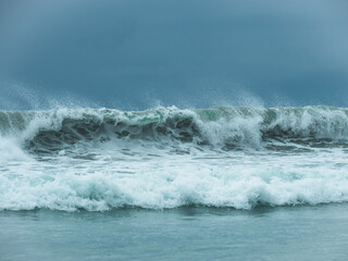 wave breaking on the beach