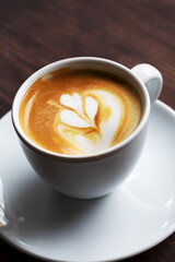 Cup of coffee. Morning atmospheric lighting, fashionable trendy spot soft focus. Preparation for design creative menu.