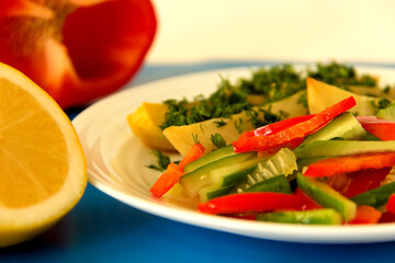 Fresh vegetable salad with potatoes. Close-up. Side view..