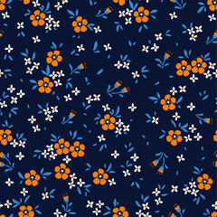 Fototapeta na wymiar Vector seamless pattern. Pretty pattern in small flower. Small yellow flowers. Dark blue background. Ditsy floral background. The elegant the template for fashion prints.