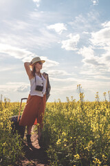 Fototapeta premium Staycations,Social distance. gen z travels alone suitcase to the covid 19 coronavirus pandemic, isolation, tourism,new normal.Staycations, hyper-local travel, Road trip,getaway, natural environment