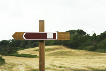 Signpost and directional road in the park