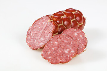Tasty meat sausages over white background
