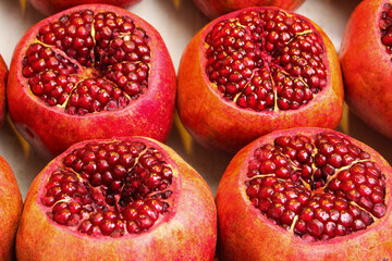 Pomegranates in the street shop, seeds and large group of fruit.