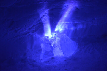 Photo of real natural Ice background with purple light rays - landscape