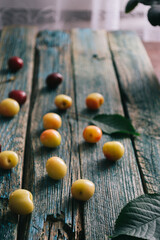 Fresh homemade ripe cherries on a wooden old background. Summer still life