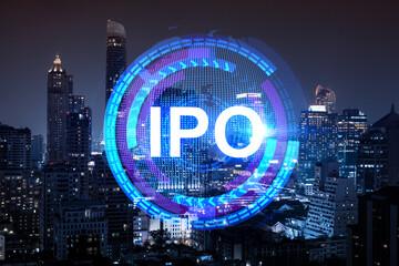 Initial public offering hologram, night panoramic city view of Bangkok. The financial center for...