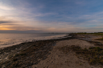 Sunset on the North Sea beach in East Frisia in early summer
