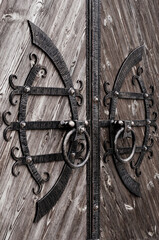 Beautiful forged retro style handles on the gate