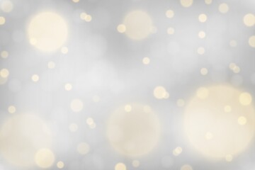 Silver bokeh background. Christmas glowing silver and golden lights with sparkles. Holiday decorative effect.