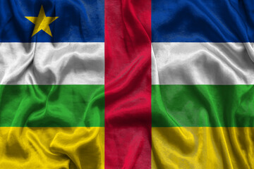 Central African Republic national flag background with fabric texture. Flag of CAR waving in the wind. 3D illustration.
