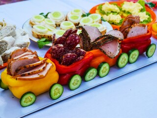 Pepper train with appetizers on the festive table
