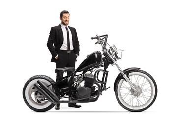 Obraz na płótnie Canvas Businessman checking a chopper motorbike willing to buy