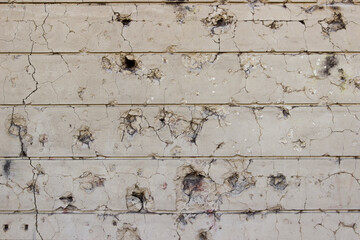 Concrete wall background with bullet holes. Concrete wall background.