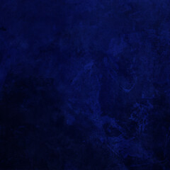 Dark blue textured abstract background.