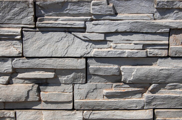 Decorative facing stone, stone with a gray tint
