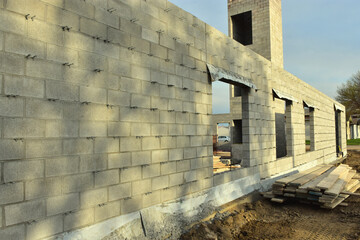 Reinforced concrete block walls for new multi story commercial building under construction.