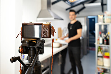 Food blogger blogger is recording tutorial online in front of camera. Welness coach. vlog video live streaming at home