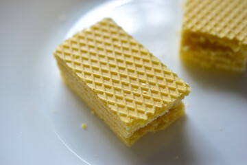 Some delicious sugar waffles on a white plate