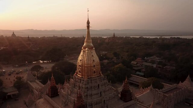 Myanmar, Ancient Bagan City, Drone Aerial View of Golden Stupa on Ananda Buddhist Temple in Twilight