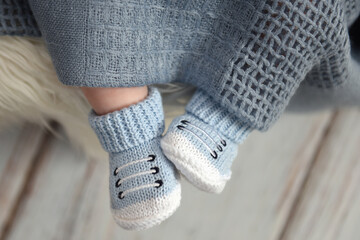 baby legs in handmade booties - 354720953