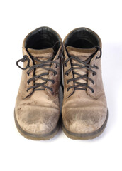Old leather work boots. Isolated objects on a white background