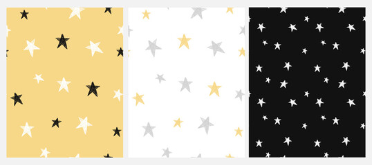 Fototapeta na wymiar Tiny Sketched Stars Vector Patterns. Irregular Hand Drawn Simple Starry Sky Print for Fabric, Textile, Wrapping Paper. Infantile Style Galaxy Design.Little Stars Isolated on a White, Black and Yellow.
