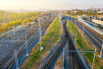 Railway station with wagons during sunrise from above