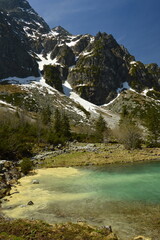 Naklejka na ściany i meble Poland Tatra mountains. Blue sky over the Tatra Mountains. Spring in the Tatras. Morskie Oko