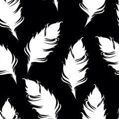 Obraz premium White feather silhouette isolated on black background. Seamless pattern. Vector illustration