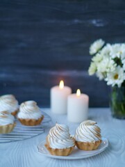 wedding cake with candles and flowers
