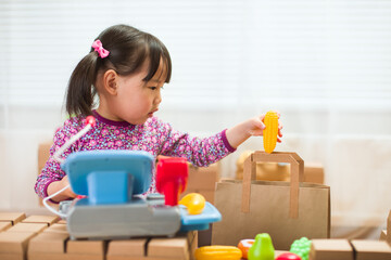 toddler girl pretend play  shop keeper at home
