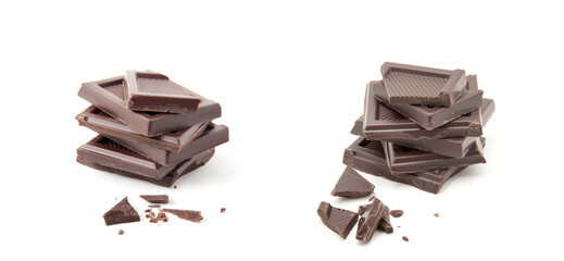 Roughly cut chunks of a chocolate bar isolated over white background