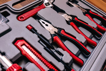 close-up of different types of tools in a box.