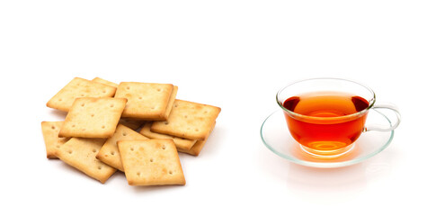 Cup of tea and cookies isolated on white