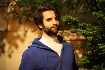 portrait, young, handsome, person, guy, boy, happy, smile, outdoors, face, people, smiling, park, casual, outdoor, outside, one, men, hair, nature, looking, green, summer, shirt, model