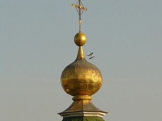 golden cross on the ceiling