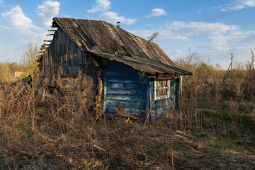 Old abandoned wooden house in the countryside