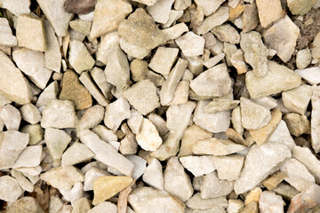 Background with light stones. The texture of the stones for design and advertising. Stones for decorating the garden