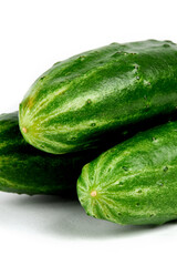 group of a fresh tasty cucumbers isolated on white background.
