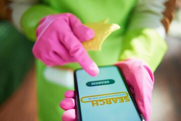 modern woman with wipe searching for cleaning service