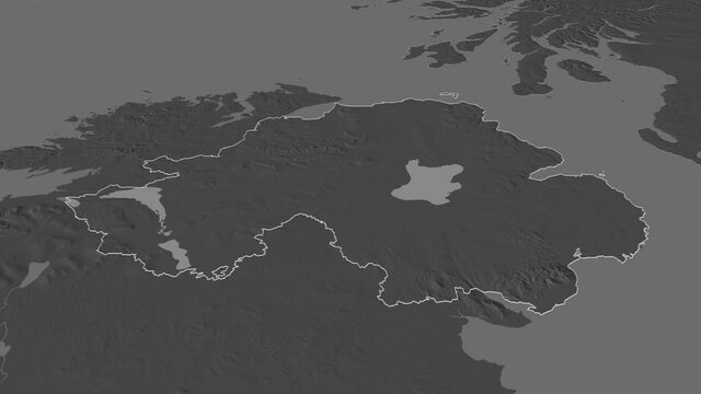 Northern Ireland, region with its capital, zoomed and extruded on the bilevel map of United Kingdom in the conformal Stereographic projection. Animation 3D
