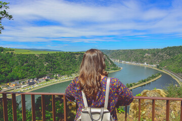 Woman resting, watching from the edge the abyss beneath