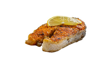 Grilled salmon steak with lemon slice isolated on a white background